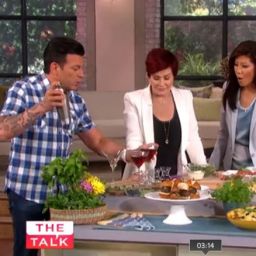 David Tutera showing celebrity hosts how to make cocktail drinks in “The Talk” TV show